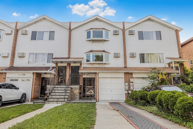 3665 Varian Ave, Bronx, NY 10466 - multi unit property featuring driveway, a garage, and a wall mounted air conditioner