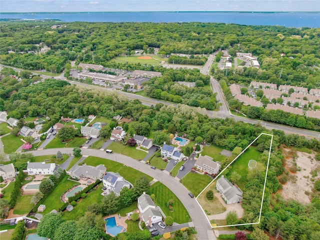 49 Tallmadge Trl, Miller Place, NY 11764 - aerial perspective of suburban area featuring property parcel outlined, a nearby body of water, and a forest