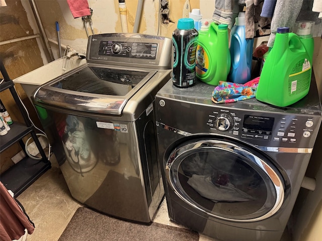 27 Pandora Dr, Brentwood, NY 11717 - laundry area with washing machine and clothes dryer