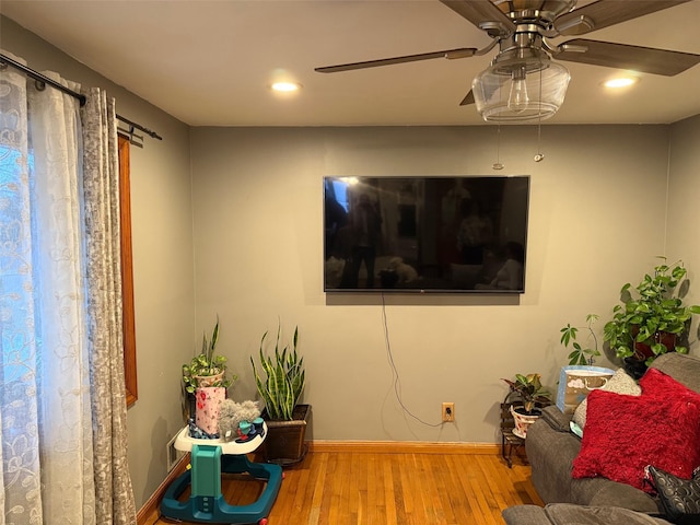27 Pandora Dr, Brentwood, NY 11717 - living area featuring wood finished floors, baseboards, a ceiling fan, and recessed lighting