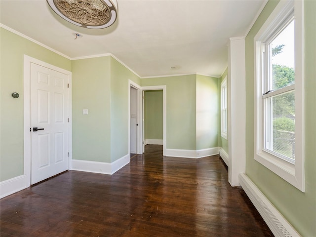 34 Woodland Ave, Poughkeepsie, NY 12603 - unfurnished room featuring a baseboard radiator, hardwood / wood-style floors, baseboards, and ornamental molding