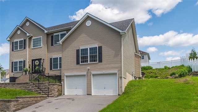 38 Panorama Dr, New Windsor, NY 12553 - view of front facade with a garage, asphalt driveway, a front yard, and roof with shingles