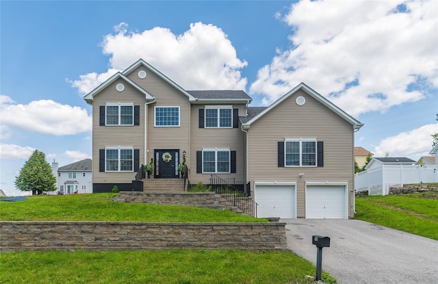 38 Panorama Dr, New Windsor, NY 12553 - view of front of property with a garage, asphalt driveway, and a front lawn