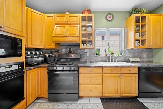 1370 Kearney Ave, Bronx, NY 10465 - kitchen featuring black appliances, a sink, light tile patterned floors, custom range hood, and decorative backsplash