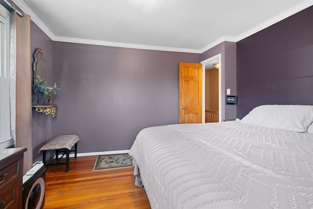 1370 Kearney Ave, Bronx, NY 10465 - bedroom featuring wood finished floors, crown molding, and baseboards