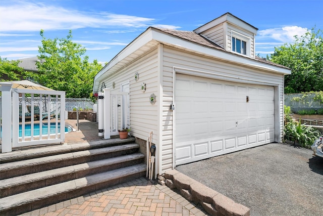 1370 Kearney Ave, Bronx, NY 10465 - garage with asphalt driveway