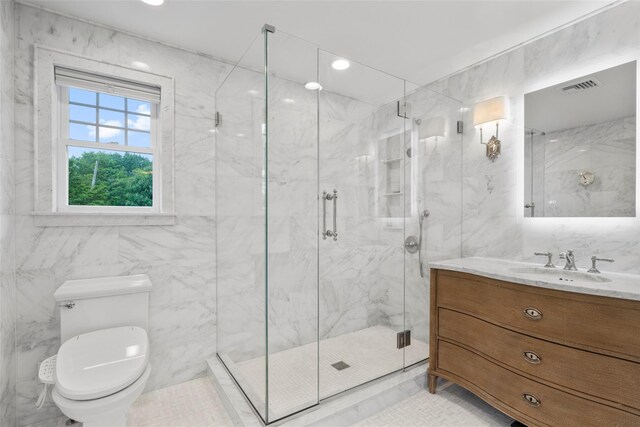 489 Manor Ln, Pelham, NY 10803 - full bath with tile walls, toilet, vanity, and a marble finish shower