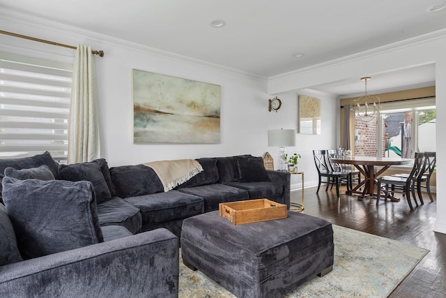 1696 Coral Rd, East Meadow, NY 11554 - living area with crown molding, a chandelier, dark wood-style flooring, and baseboards