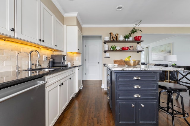 1696 Coral Rd, East Meadow, NY 11554 - kitchen with dishwasher, crown molding, white cabinetry, a sink, and tasteful backsplash