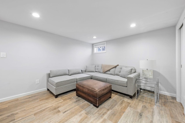 1696 Coral Rd, East Meadow, NY 11554 - living room featuring light wood finished floors, recessed lighting, and baseboards
