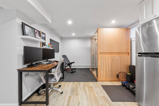 1696 Coral Rd, East Meadow, NY 11554 - office space with light wood-type flooring, recessed lighting, baseboards, and a baseboard radiator
