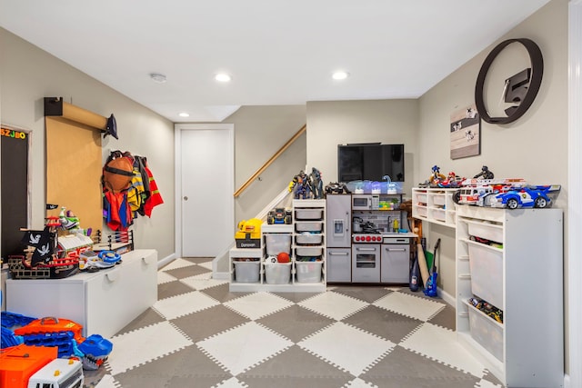 1696 Coral Rd, East Meadow, NY 11554 - game room with tile patterned floors, recessed lighting, and baseboards