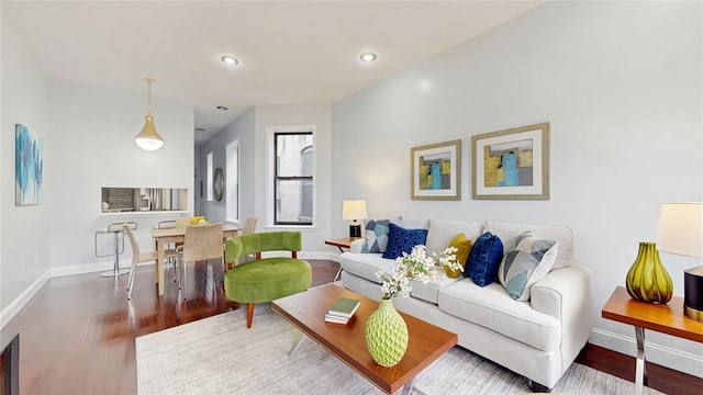 2611 Frederick Douglass Blvd Unit 5D, New York Manhattan, NY 10030 - living room featuring wood finished floors, baseboards, and recessed lighting