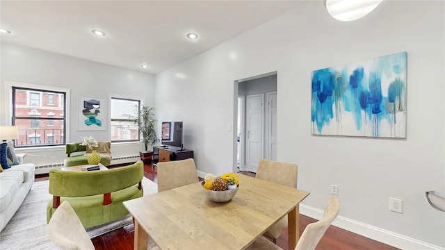 2611 Frederick Douglass Blvd Unit 5D, New York Manhattan, NY 10030 - dining room featuring dark wood finished floors, a baseboard radiator, recessed lighting, and baseboards