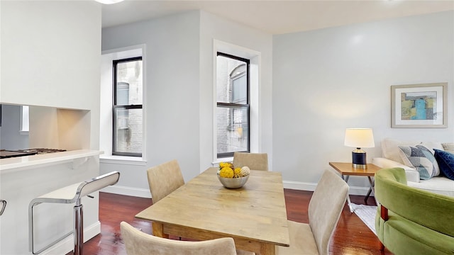 2611 Frederick Douglass Blvd Unit 5D, New York Manhattan, NY 10030 - dining room featuring dark wood-style floors, healthy amount of natural light, and baseboards