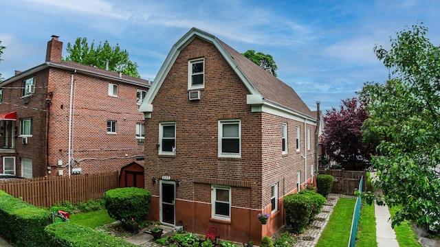 230 Pennyfield Ave, Bronx, NY 10465 - back of house featuring brick siding and roof with shingles