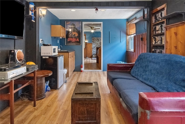 230 Pennyfield Ave, Bronx, NY 10465 - living area with light wood finished floors and ceiling fan