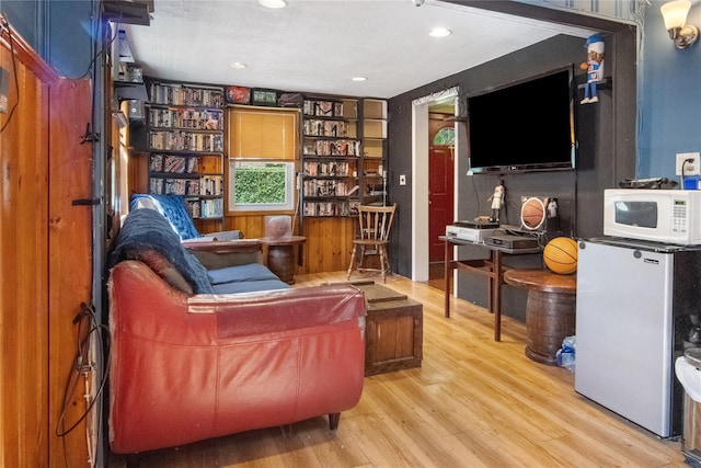 230 Pennyfield Ave, Bronx, NY 10465 - living area with wood finished floors and recessed lighting