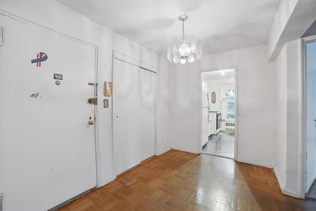 682 Tuckahoe Rd Unit 1A, Yonkers, NY 10710 - entrance foyer featuring a chandelier
