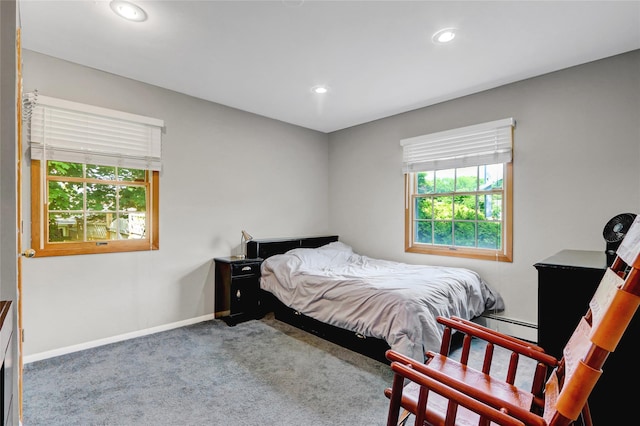 12 Bridle Path Ln, Port Jefferson, NY 11777 - bedroom with baseboard heating, carpet flooring, recessed lighting, and baseboards