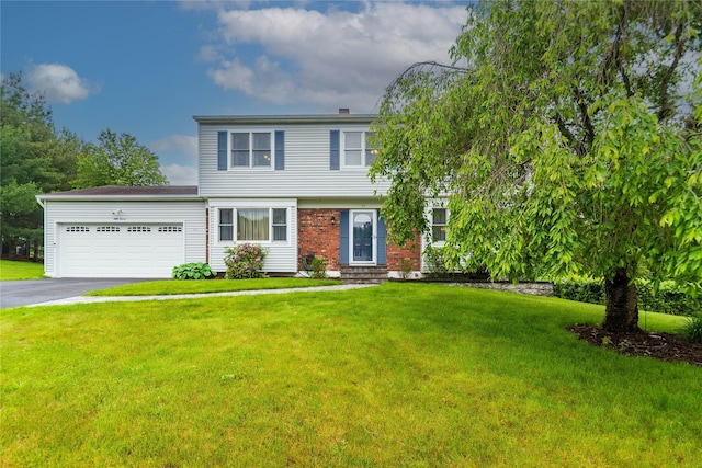57 Decker Dr, Washingtonville, NY 10992 - view of front facade with driveway, an attached garage, and a front lawn