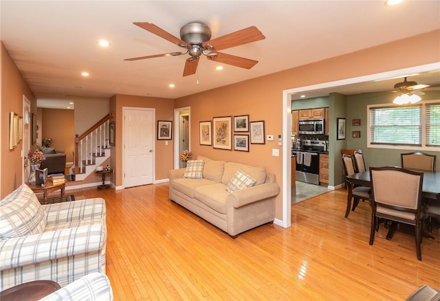 57 Decker Dr, Washingtonville, NY 10992 - living room featuring a ceiling fan, stairway, recessed lighting, light wood finished floors, and baseboards