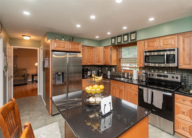 57 Decker Dr, Washingtonville, NY 10992 - kitchen with stainless steel appliances, a sink, tasteful backsplash, dark stone countertops, and recessed lighting