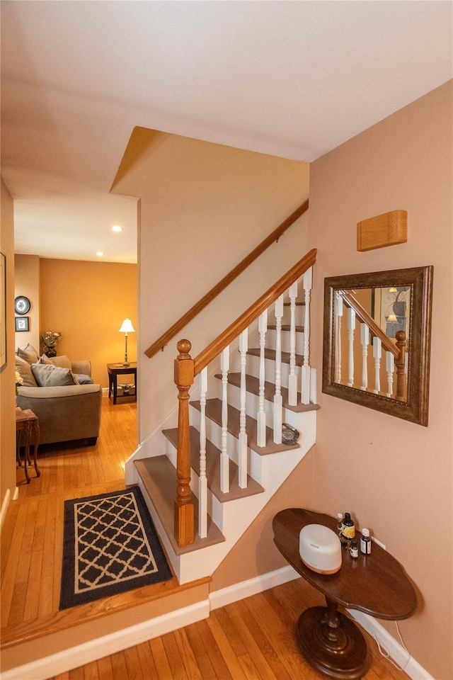57 Decker Dr, Washingtonville, NY 10992 - staircase featuring hardwood / wood-style floors, recessed lighting, and baseboards