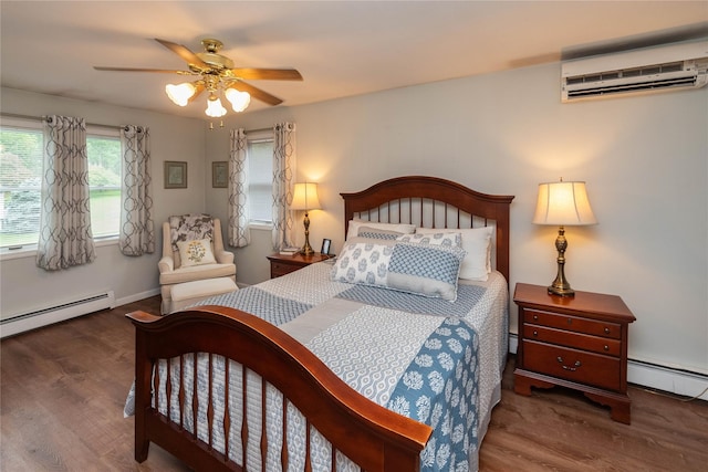 57 Decker Dr, Washingtonville, NY 10992 - bedroom featuring a wall unit AC, wood finished floors, and a baseboard heating unit