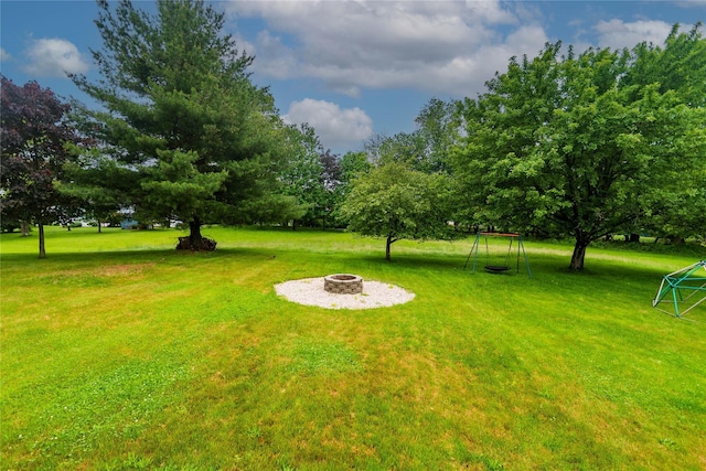 57 Decker Dr, Washingtonville, NY 10992 - view of green lawn featuring an outdoor fire pit