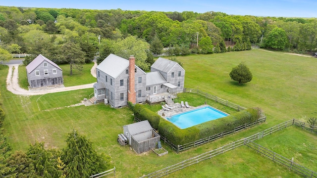 140AND144 Damascus Rd, East Quogue, NY 11942 - view from above of property with a pool area and a heavily wooded area