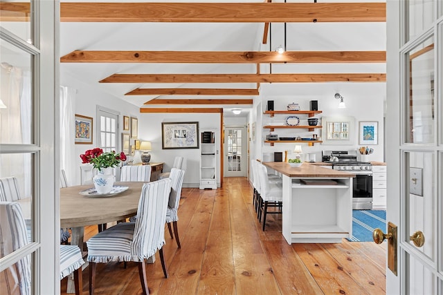 140AND144 Damascus Rd, East Quogue, NY 11942 - dining room featuring light wood finished floors and beamed ceiling