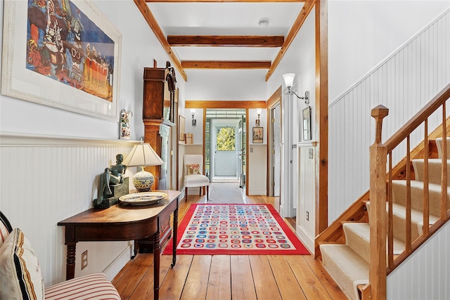 140AND144 Damascus Rd, East Quogue, NY 11942 - foyer entrance with beam ceiling, wood-type flooring, and stairway