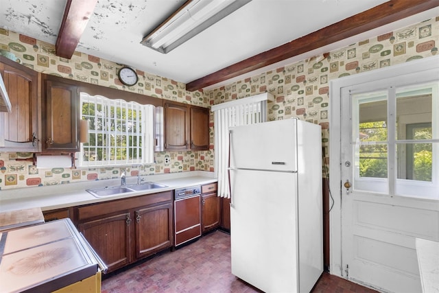 61 Spackenkill Rd, Poughkeepsie, NY 12603 - kitchen featuring freestanding refrigerator, a sink, beam ceiling, dishwashing machine, and wallpapered walls