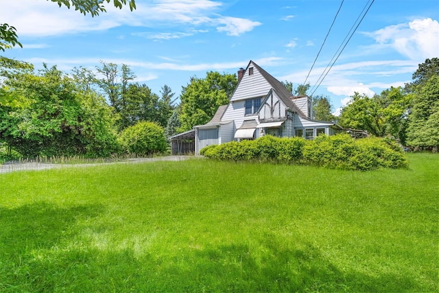 61 Spackenkill Rd, Poughkeepsie, NY 12603 - view of home's exterior with a chimney and a carport