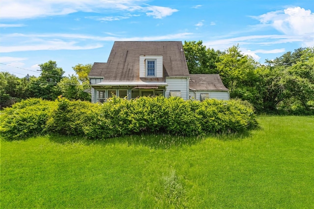 61 Spackenkill Rd, Poughkeepsie, NY 12603 - view of home's exterior with a sunroom