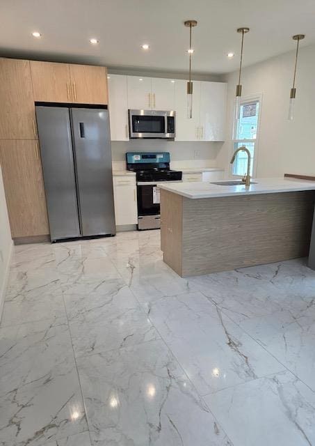 140 Ball St, Port Jervis, NY 12771 - kitchen with stainless steel appliances, modern cabinets, a sink, light countertops, and recessed lighting