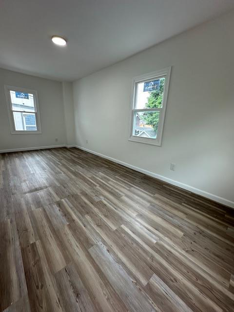140 Ball St, Port Jervis, NY 12771 - spare room with wood finished floors and baseboards