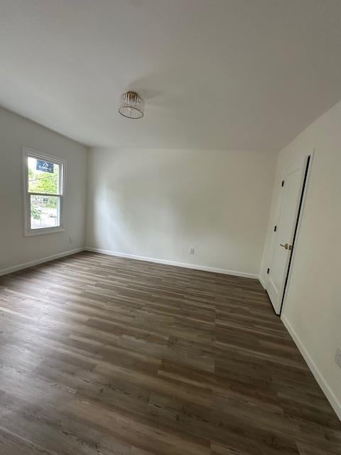 140 Ball St, Port Jervis, NY 12771 - spare room with baseboards and dark wood-style flooring