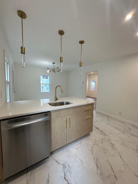 140 Ball St, Port Jervis, NY 12771 - kitchen featuring dishwasher, a sink, light brown cabinets, and light countertops