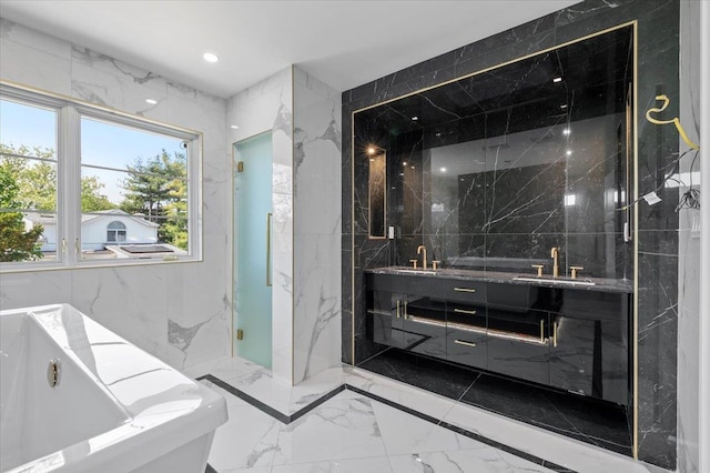 19 Maple Ave, Cedarhurst, NY 11516 - full bathroom with marble tiled floors, a freestanding bath, double vanity, and recessed lighting