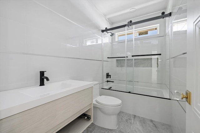 19 Maple Ave, Cedarhurst, NY 11516 - bathroom with enclosed tub / shower combo, toilet, tile walls, and vanity