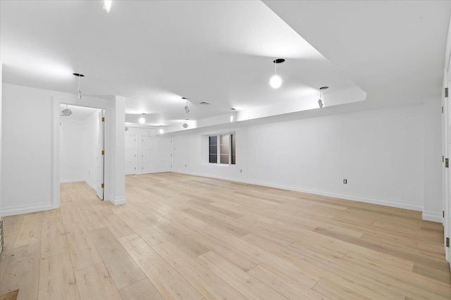 19 Maple Ave, Cedarhurst, NY 11516 - basement featuring light wood-style flooring and baseboards