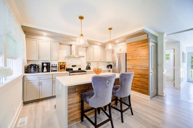 322 Noxon Rd, Poughkeepsie, NY 12603 - kitchen featuring stainless steel fridge with ice dispenser, wall chimney range hood, stove, light wood-style floors, and light countertops