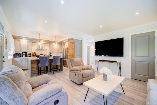 322 Noxon Rd, Poughkeepsie, NY 12603 - living room featuring light wood-style floors, recessed lighting, and ornamental molding