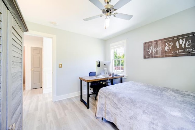 322 Noxon Rd, Poughkeepsie, NY 12603 - bedroom featuring light wood finished floors, baseboards, a desk, and a ceiling fan