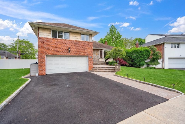5 Coventry Rd, Syosset, NY 11791 - tri-level home with asphalt driveway, a garage, and brick siding