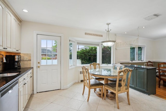 5 Coventry Rd, Syosset, NY 11791 - dining space with crown molding, light tile patterned floors, and recessed lighting