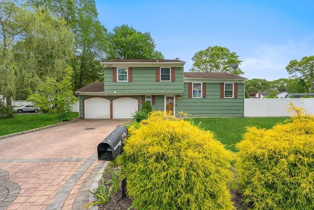 12 Pleasant Pl, Farmingville, NY 11738 - split level home featuring decorative driveway and an attached garage