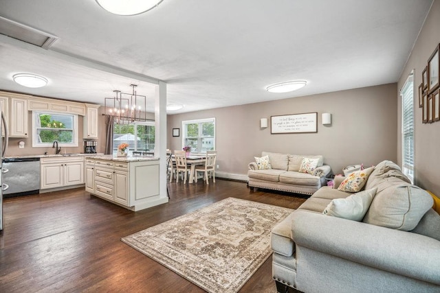 12 Pleasant Pl, Farmingville, NY 11738 - living room featuring dark wood-style floors